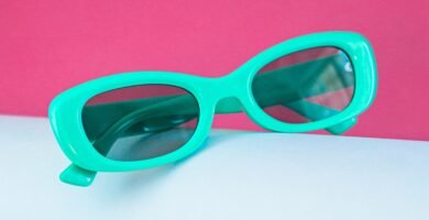 a pair of sunglasses sitting on top of a table